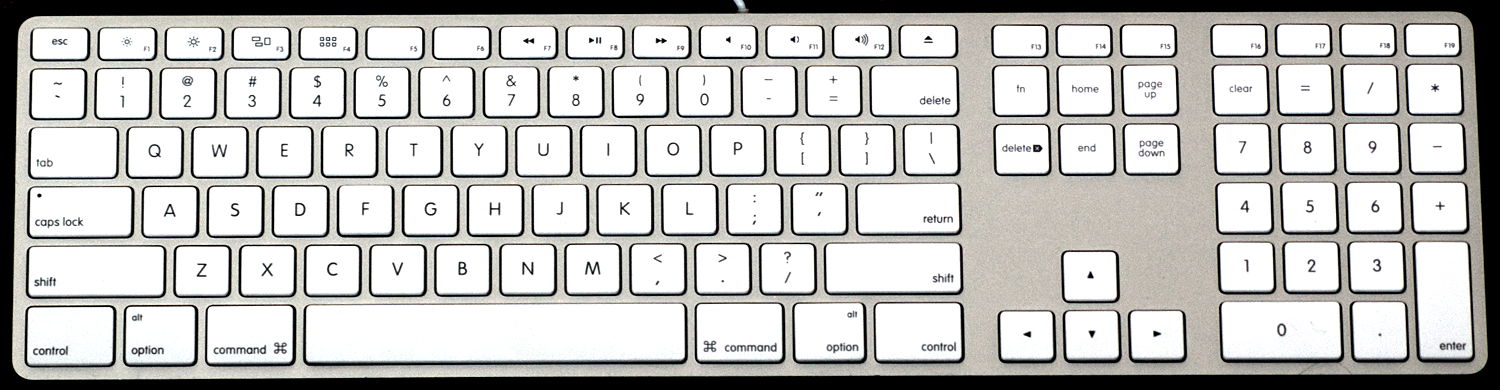 The flat aluminum version of the full Macintosh keyboard with number pad on the right side.